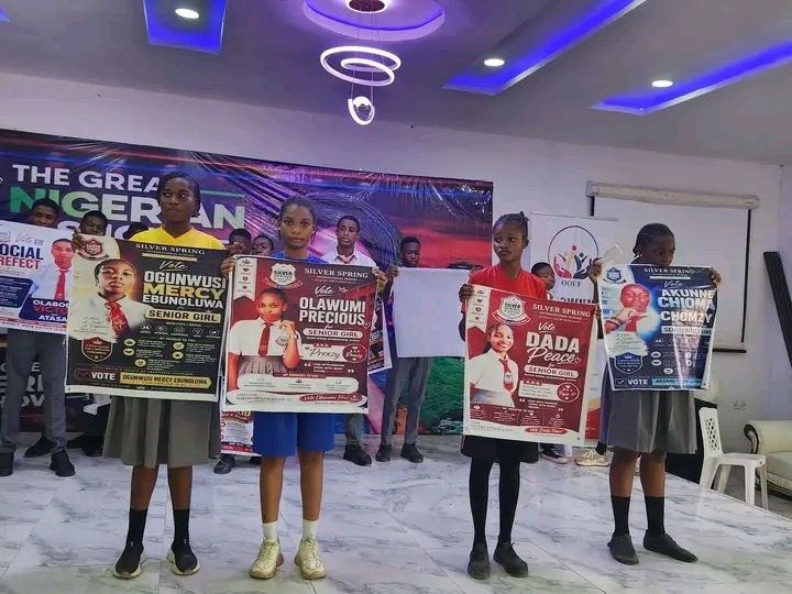 Candidates present their campaign posters at the Great Nigerian Show